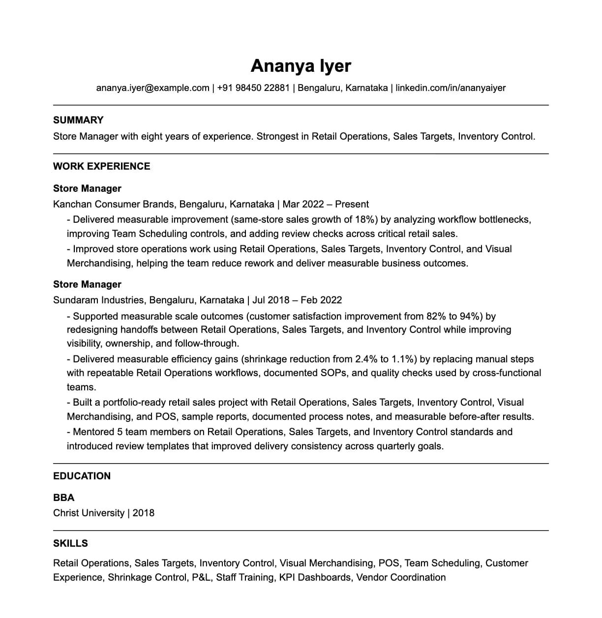 A complete one-page store manager resume: contact line, summary, two roles with quantified achievements, education and a skills list.