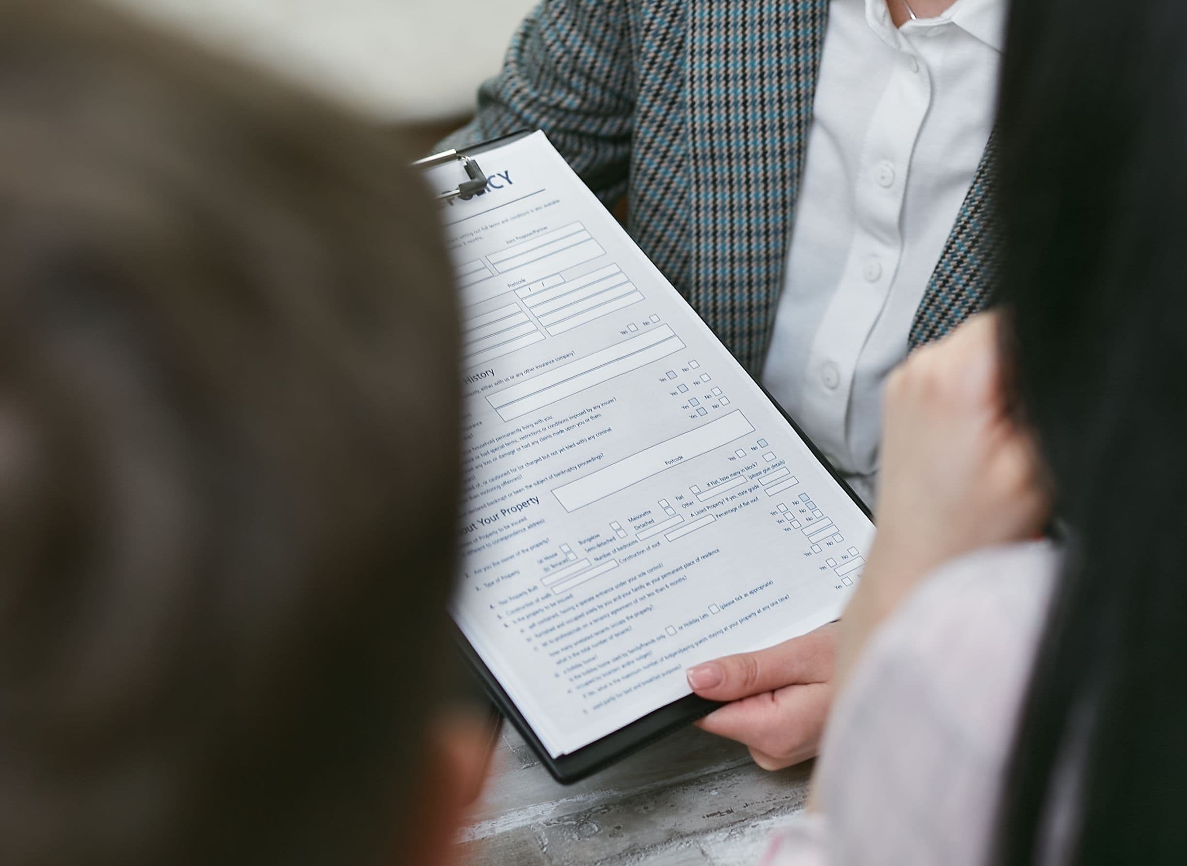 Person holding an employment notice document