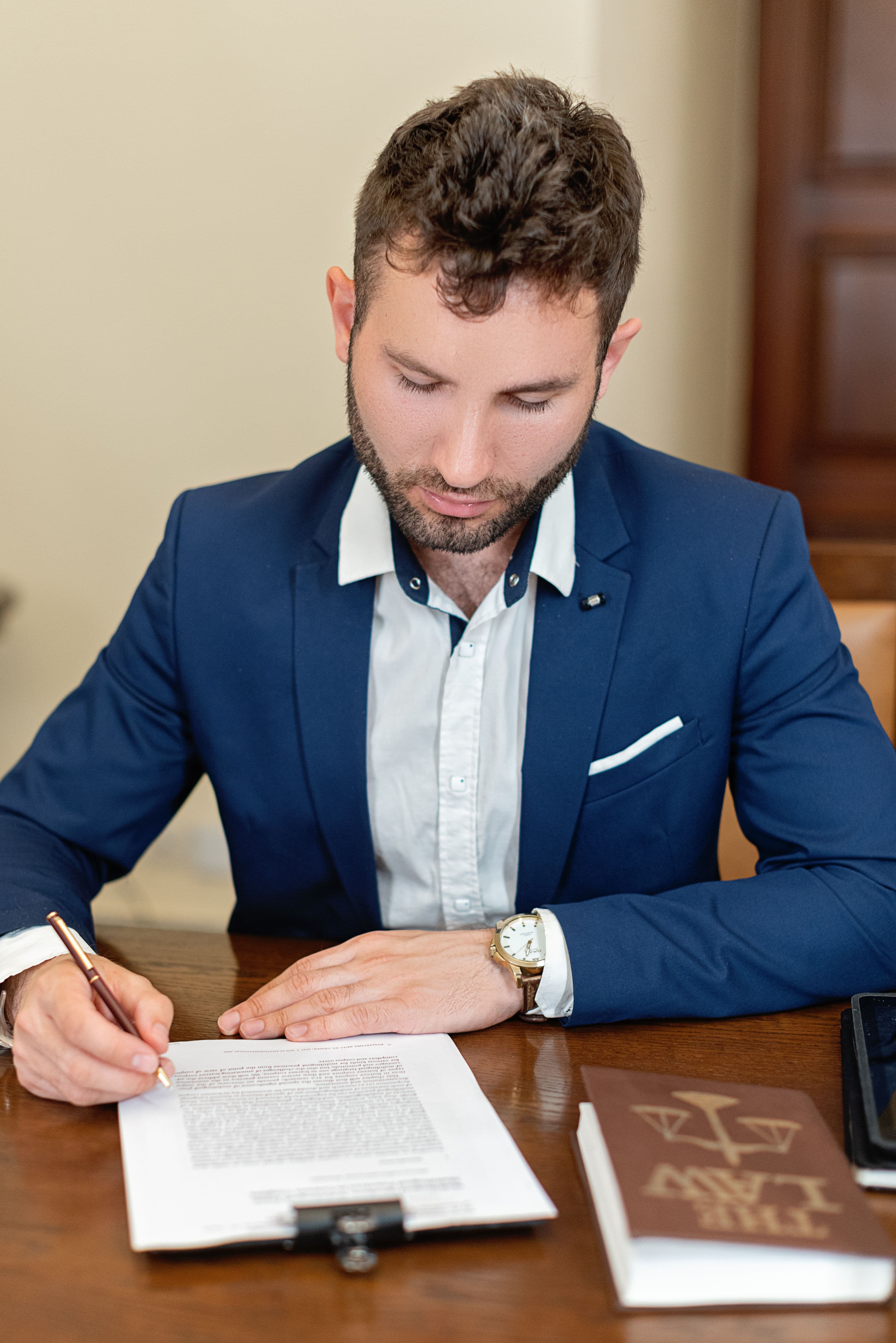 Employer signing an employment compliance document